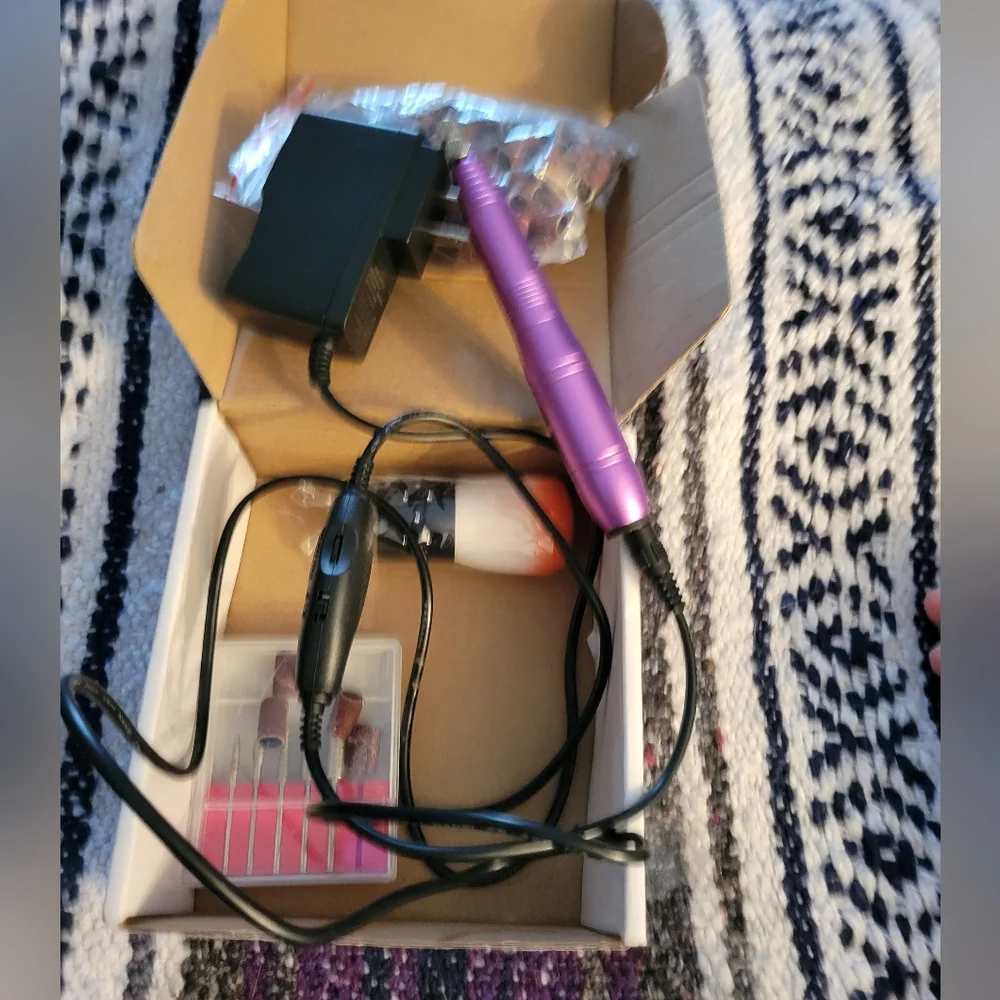 Only used once manicure electric nail drill with excessories shiny purple